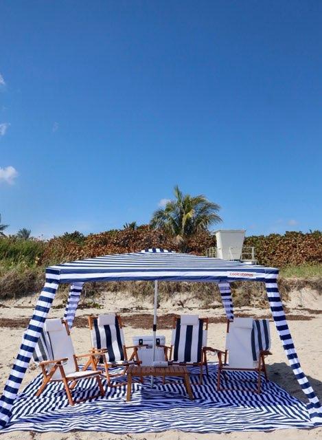 Premium beach lounge chairs and umbrella