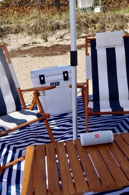 Elegant beach day experience setup